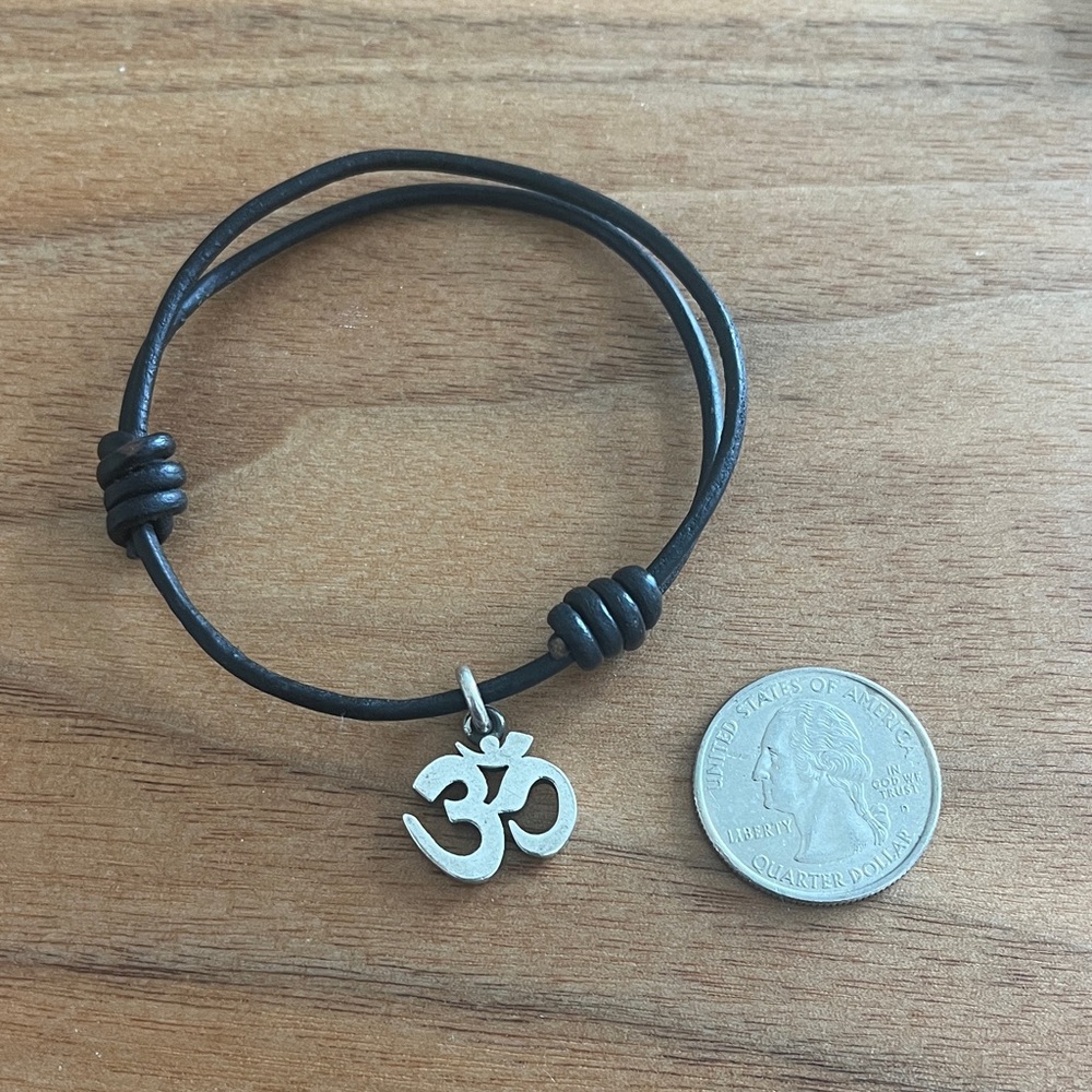 Poor Cat silver om charm bracelet
